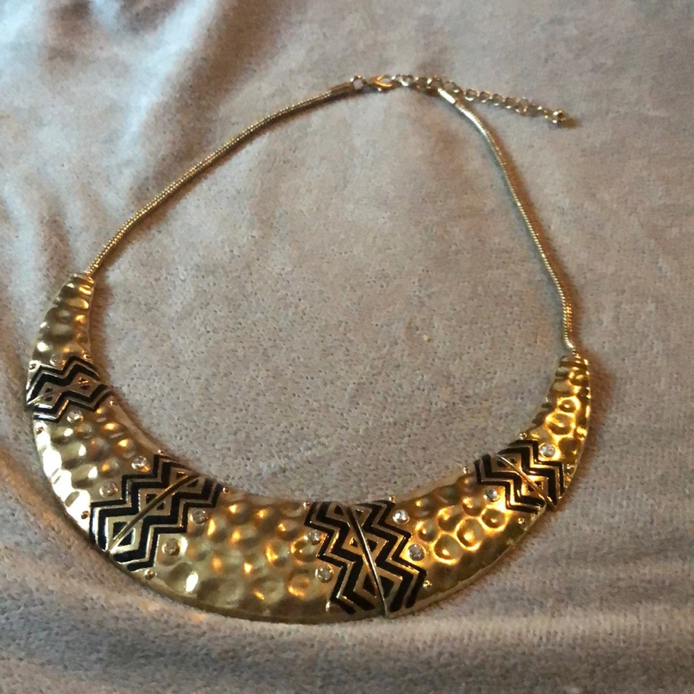 Gold statement necklace with black detail